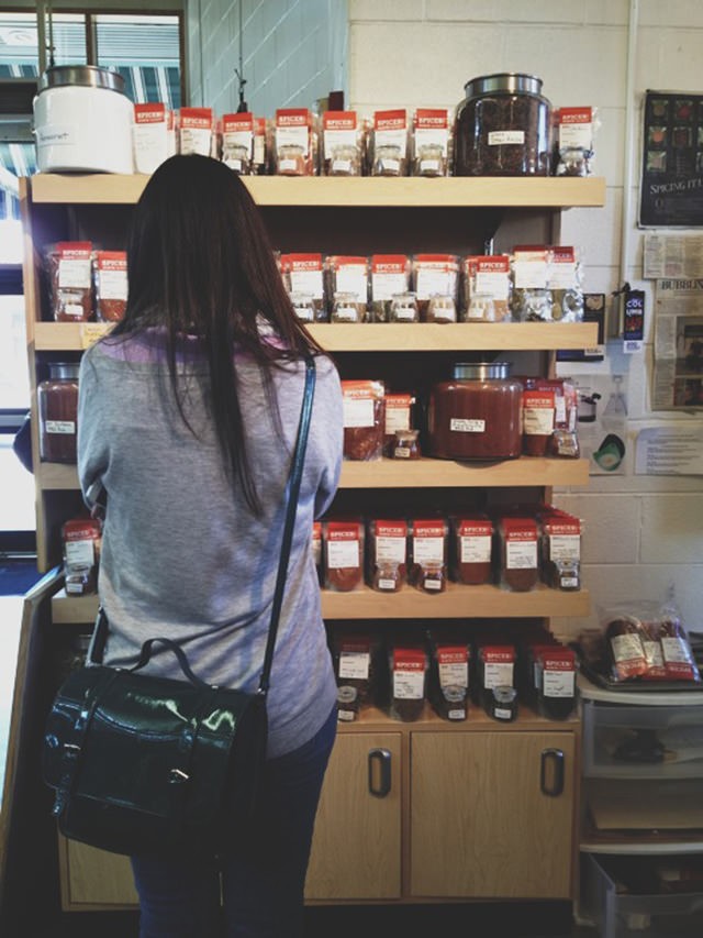 Mary looking at spices